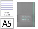 Caderno com Elástico Antartik capa dura cinza e turquesa. Formato A5, com 100 folhas, linhas cinza e turquesa. Papel com 80 grs.